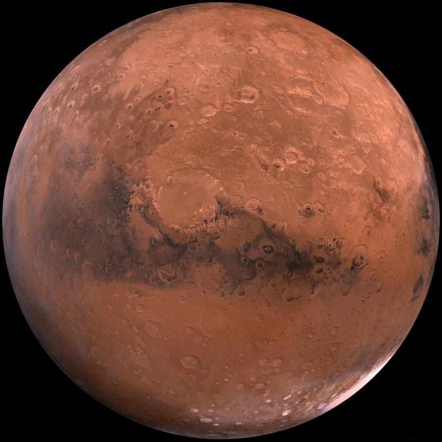 The face of Mars seen from outer space. Some ice can be seen at the poles.