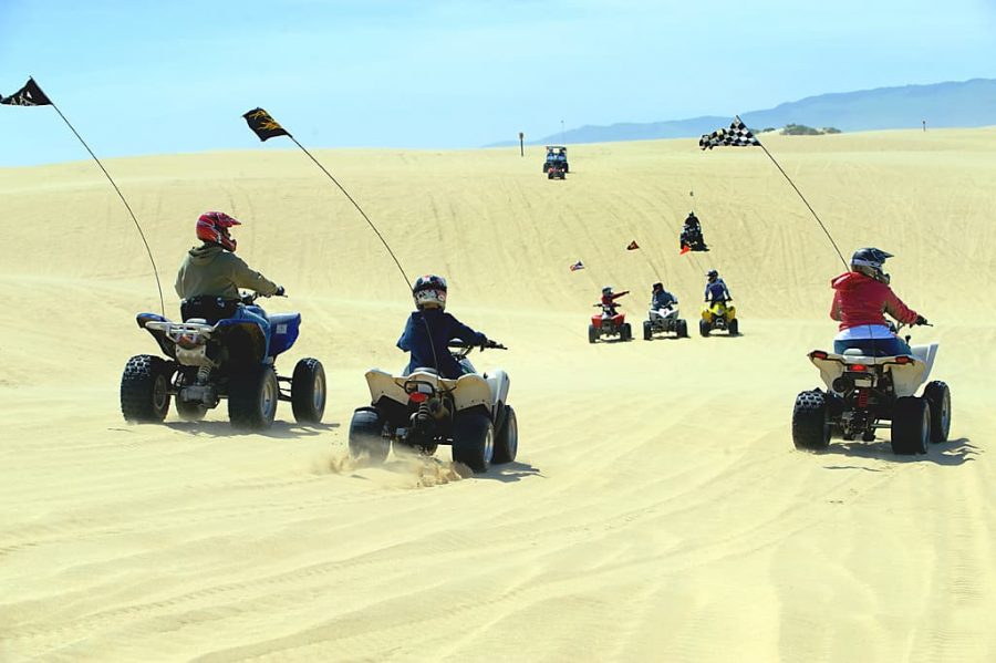 A group of OHV riders enjoy the sun at the Oceano Dunes (image courtesy of the State of California.)