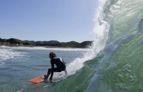 Travis Nelson catching a wave at a competition in Pismo. 