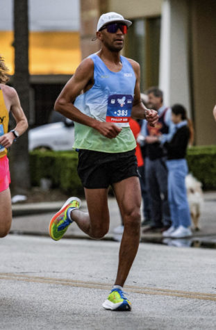 Phillip Reid running in the Houston Marathon, January 2023.