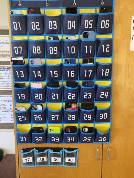Phone pockets in Ross Richardss classroom