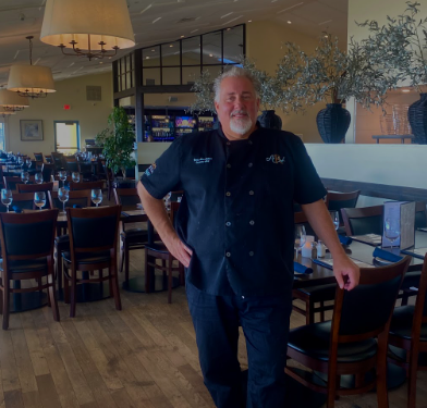 MacMillan on the floor of his newest restaurant, Vista Steak and Seafood.
