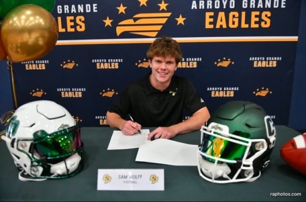 Wulff formally signing to play quarterback at Cal Poly.