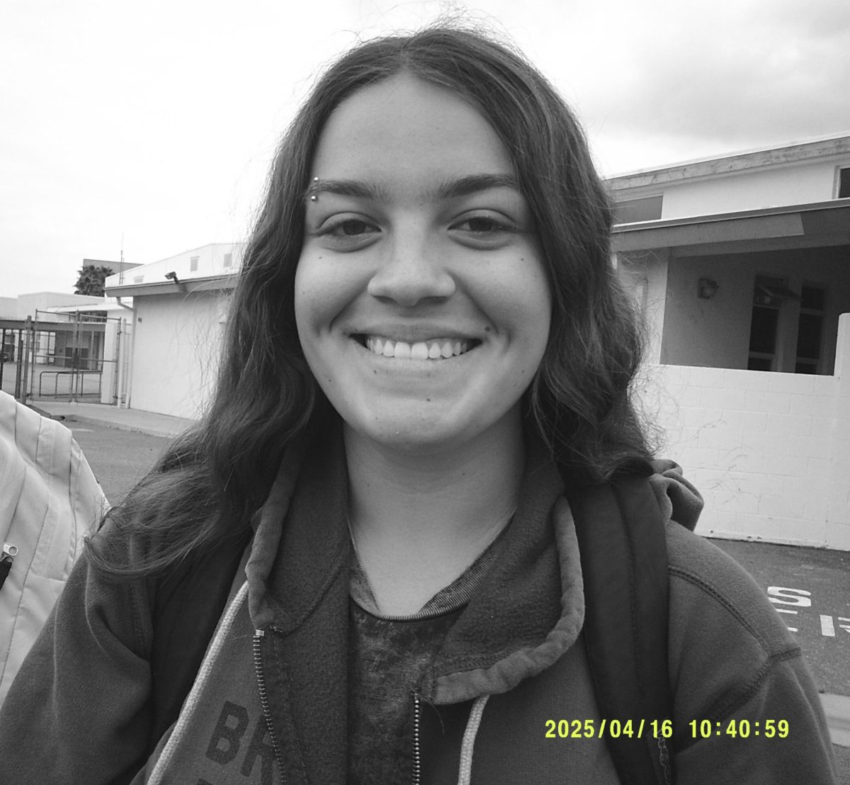 Wednesday, 10:40 a.m.-
Kailani Johnson ('27) spending time at break smiling with her friends. 