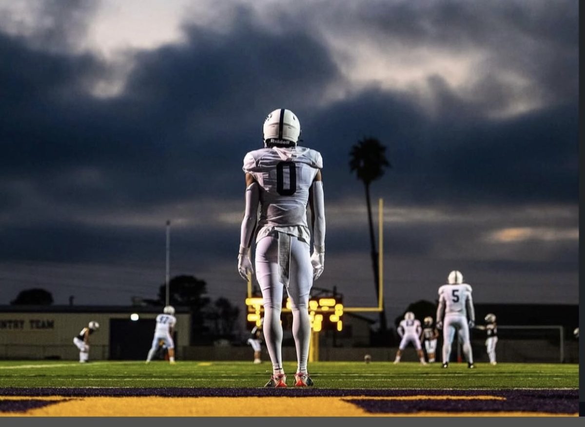 Caleb Clark warming up to play St. Joes. (Photo Credit: Joe Capra)